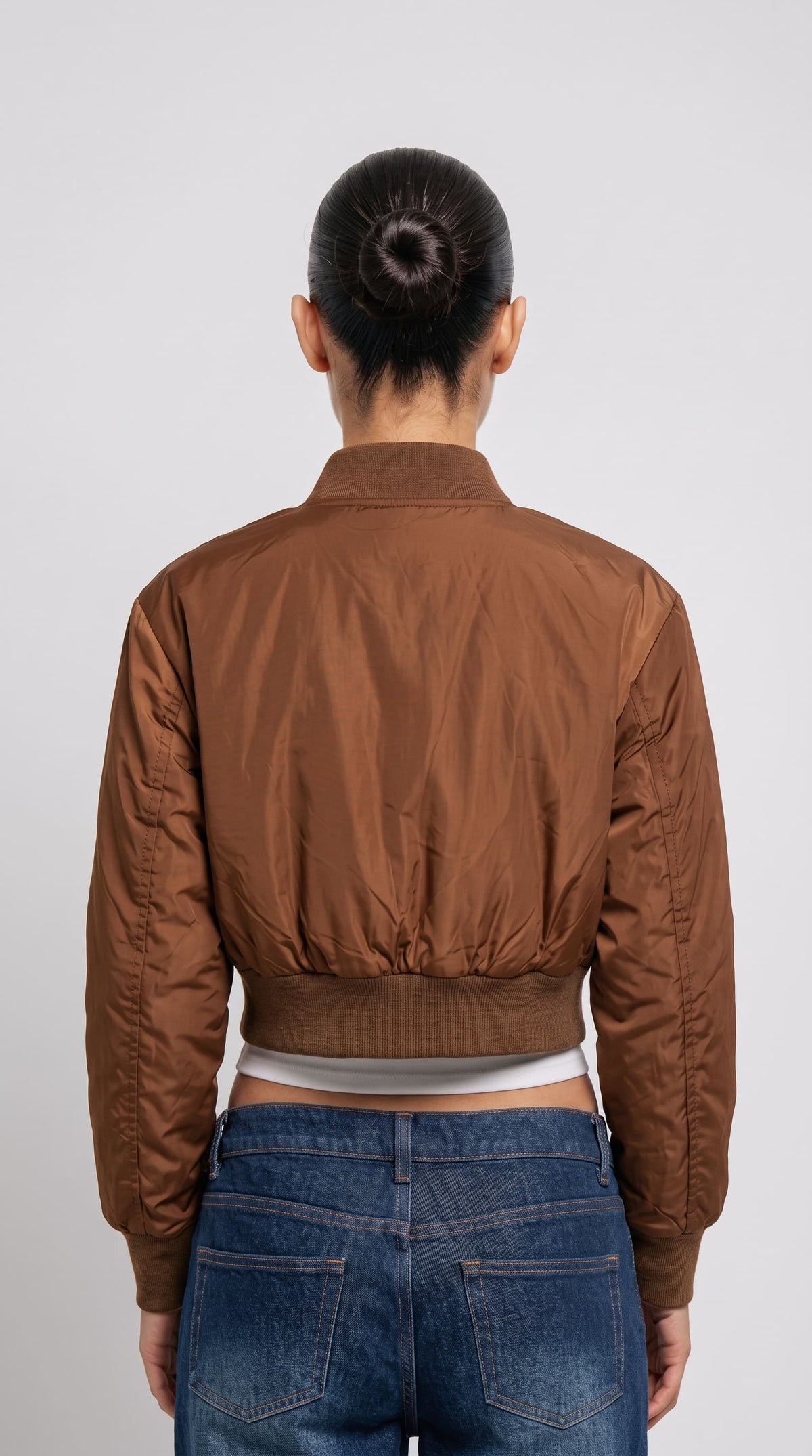 Regular fit men's tan neutral outerwear displaying clean tailored seams, functional side pockets, and a streamlined silhouette.