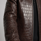 jackero Brown crocodile skin jacket worn by a person on a gray background