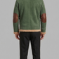 Men's olive green suede flight aviator jacket with a warm cream sheepskin collar and silver zippers.