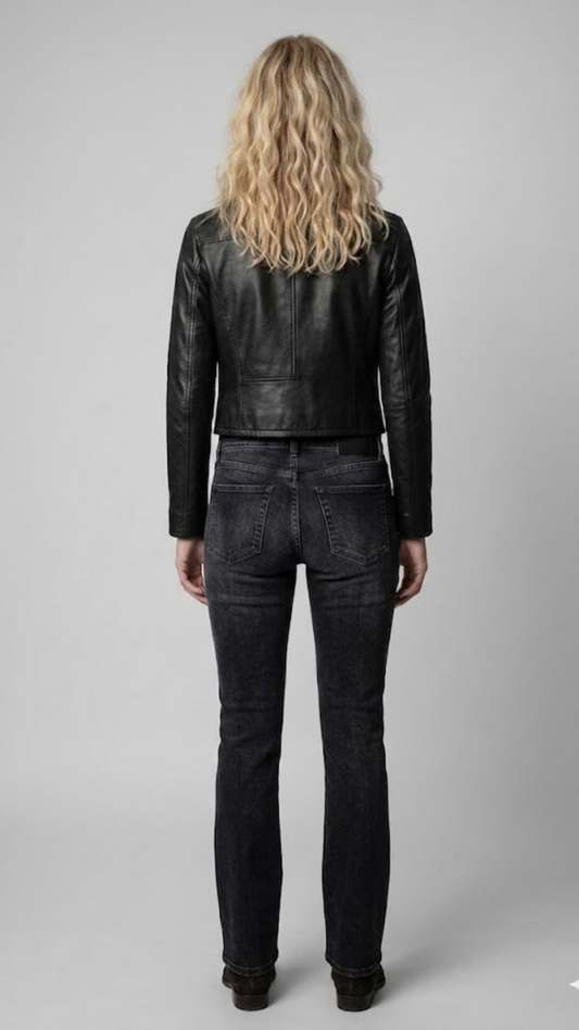 Model showcasing a fitted black genuine leather jacket for a timeless, sophisticated casual look.