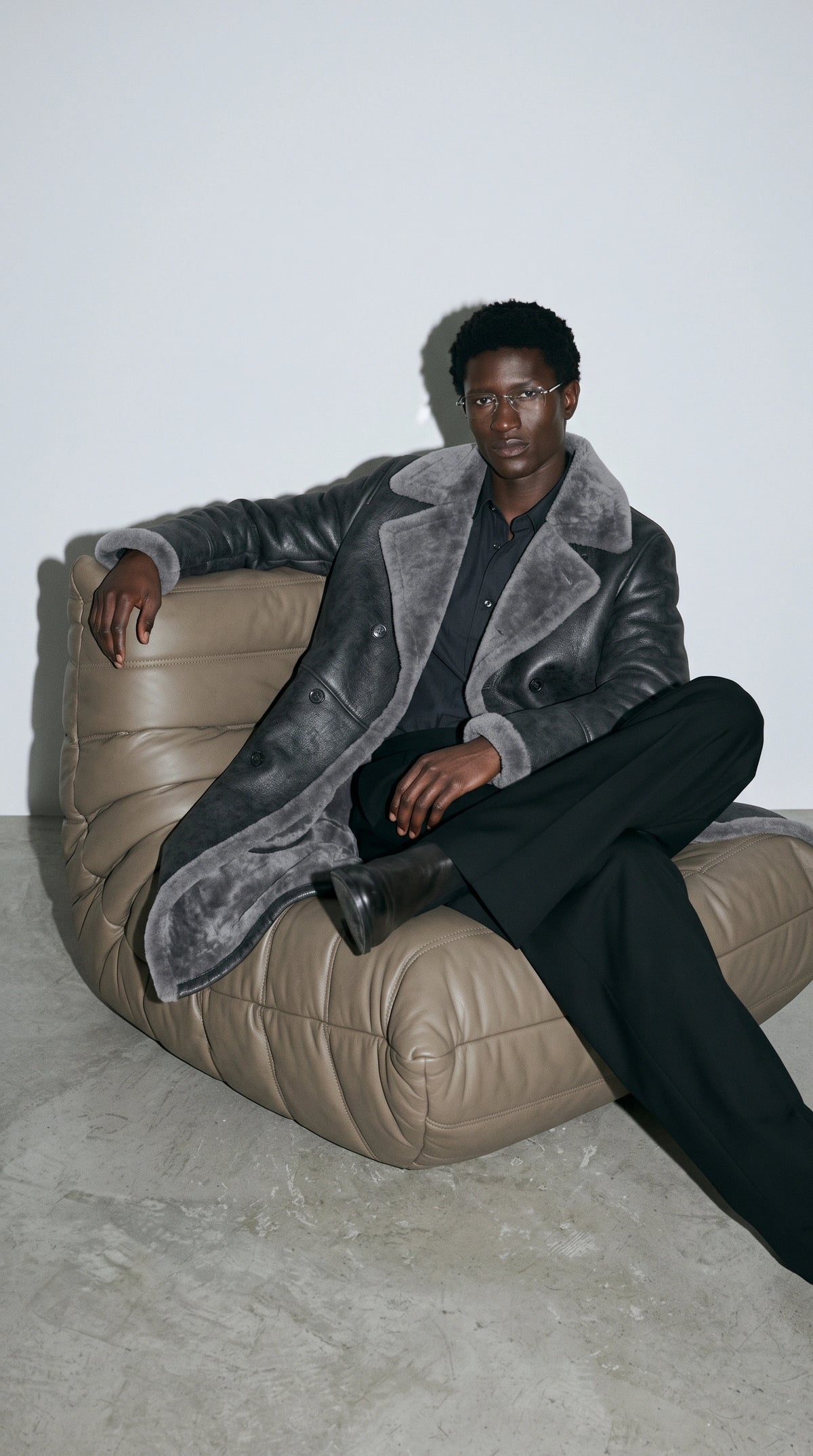Own the city nights in this commanding Jackero long dark grey leather coat, where rugged durability meets an incredibly engaging streetwear vibe through its warm faux shearling accents.