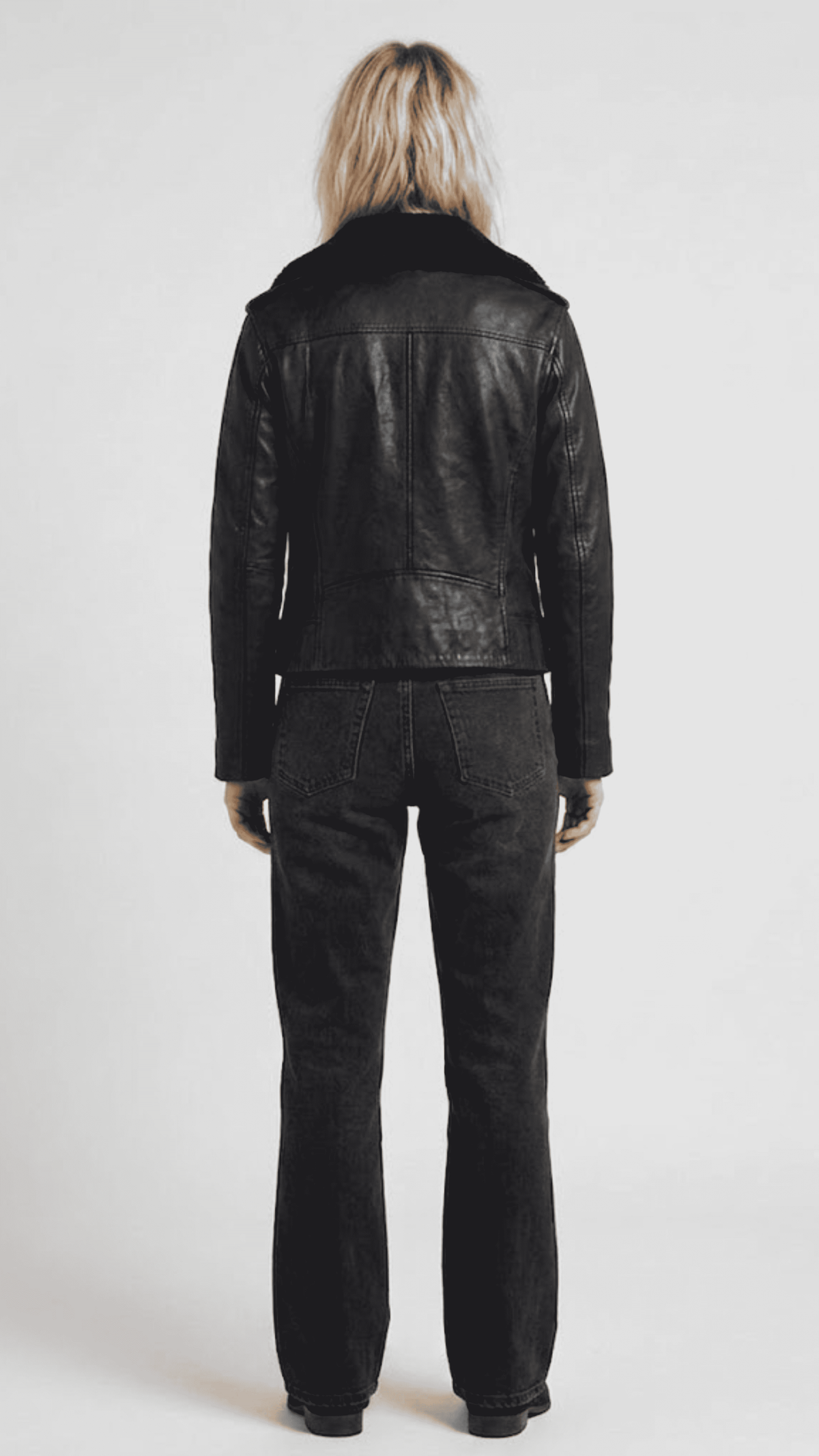 Structured back view of a luxury men's black leather biker jacket, showcasing premium paneling and enhanced shoulder alignment.