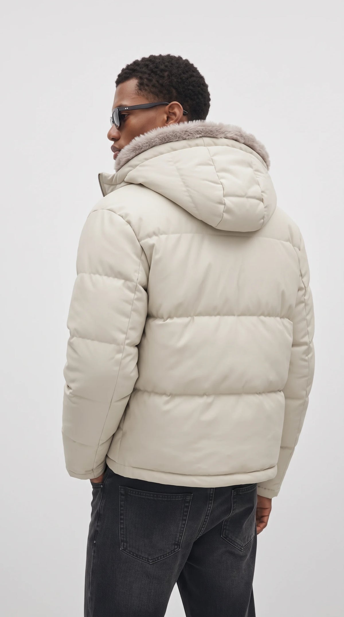 The ultimate snow-ready streetwear essential by Jackero, showcasing an icy white hooded puffer coat with premium fur detailing to keep your daily fit looking fresh and elevated.