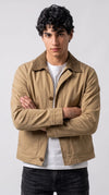 Men's tan canvas chore jacket featuring a brown corduroy collar and zip-up front closure.