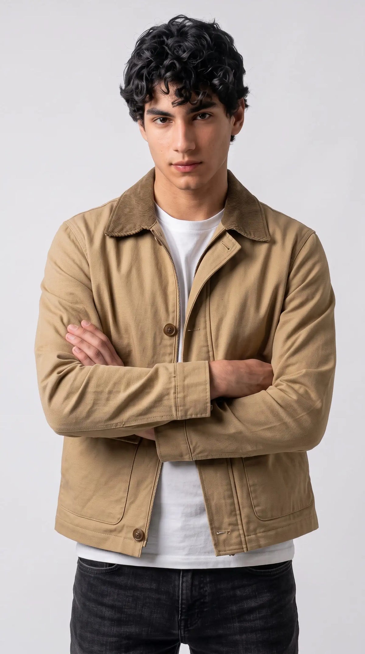 Men's tan canvas chore jacket featuring a brown corduroy collar and zip-up front closure.