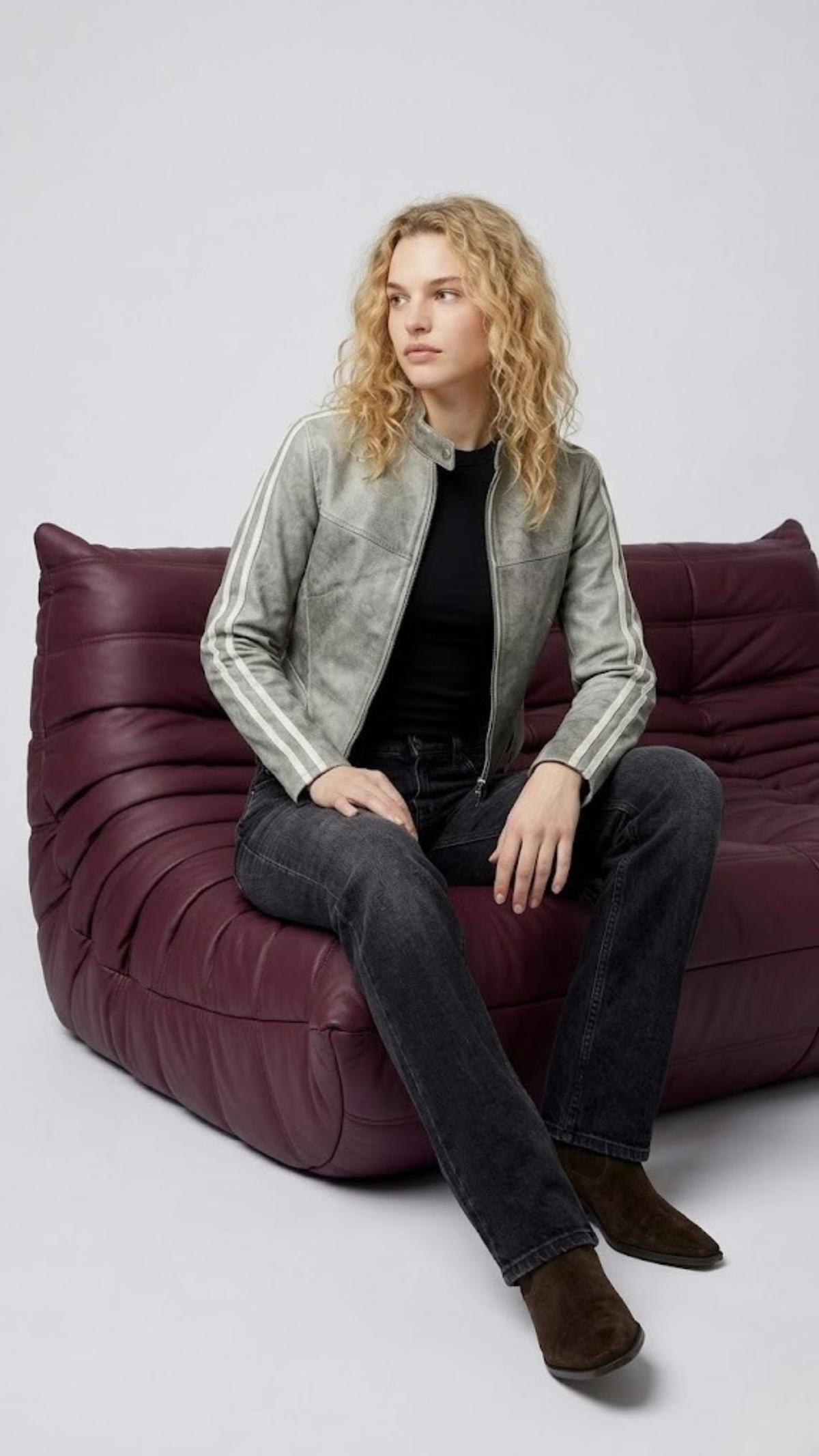 Modern monochromatic street fashion concept featuring a grey distressed leather jacket styled for an effortless edgy look.
