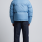 Back view of a premium light blue winter puffer coat showing high-quality stitching and padded insulation details.