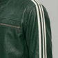 Green leather jacket with white stripes on a gray background