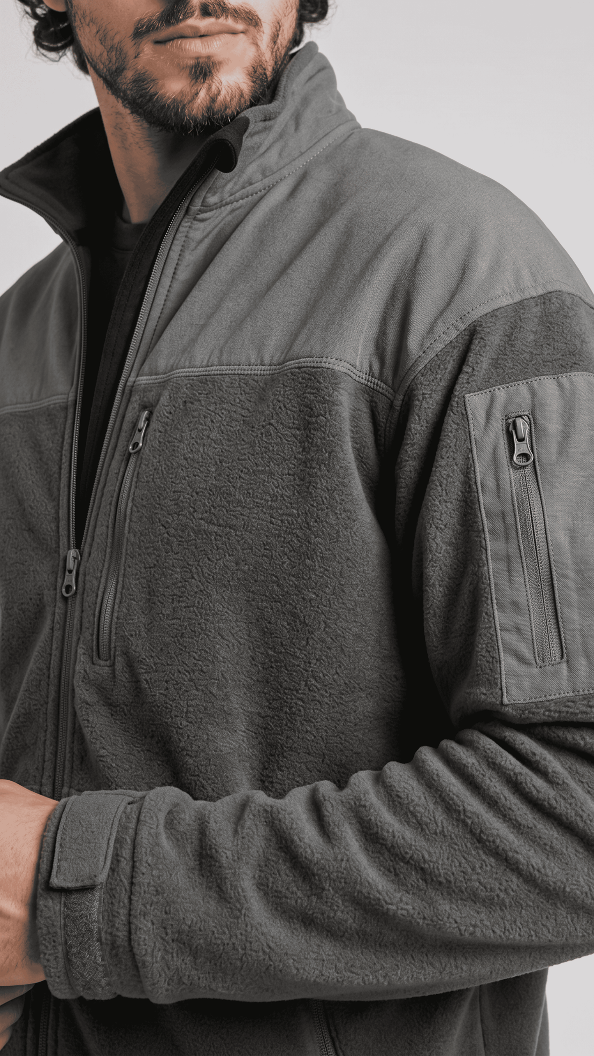 Close-up shot highlighting the ultra-soft texture and subtle color contrast between the dark grey and light grey suede panels.
