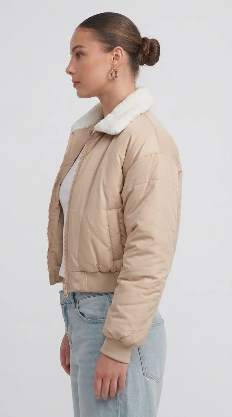 Regular fit women's off-white short line outerwear displaying clean tailored seams, side alignment, and a streamlined boxy silhouette.