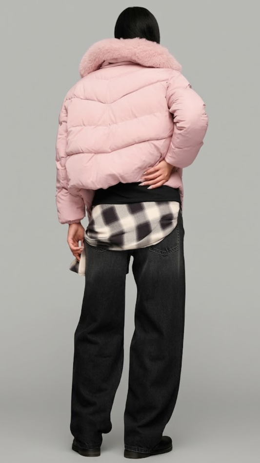 A jackero luxury women's short pink hooded puffer coat styled over a black crop top and dark relaxed-fit jeans.