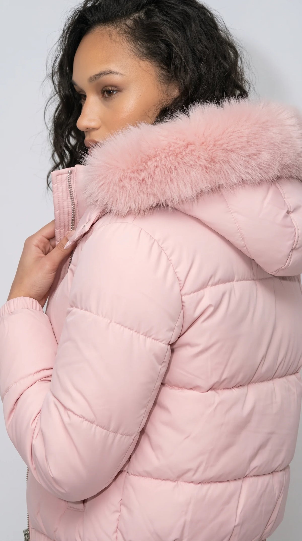 Slay the winter season in the Jackero premium baby pink fur-hooded jacket, an essential streetwear flex that delivers extreme warmth without sacrificing your high-end aesthetic.