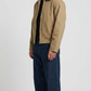 Mens stylish two tone beige and brown leather jacket styled with blue jeans