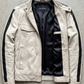 clean contemporary alabaster motorcycle jacket neatly displayed on a contrasting surface.