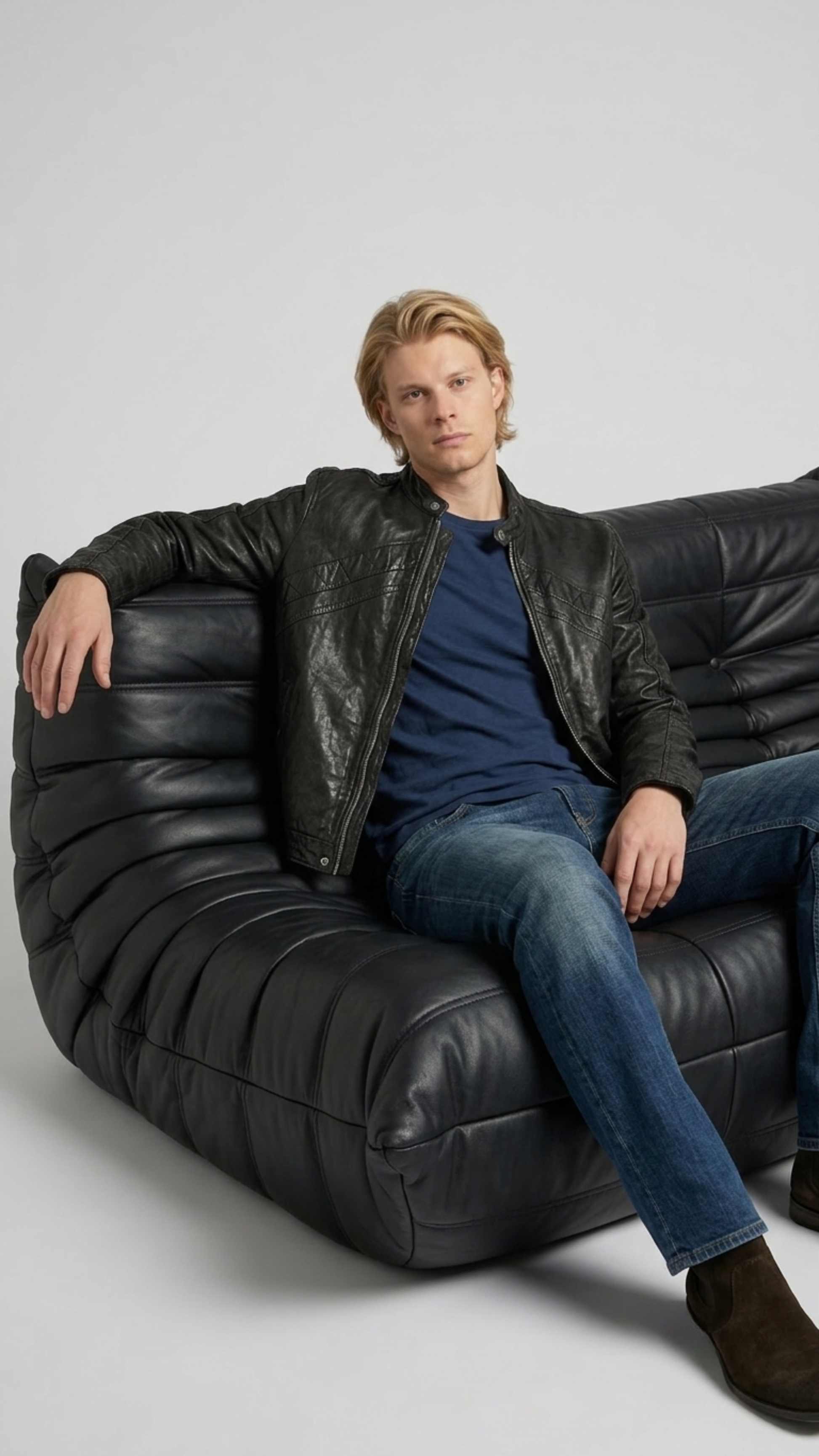 Men's timeless outerwear fashion showcasing a sleek black leather biker jacket styled effortlessly for a sharp look.