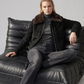 winter fashion featuring a heavy-duty black suede aviator coat with dark chocolate fur styled for an upscale streetwear look.