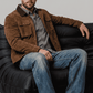 Men's timeless winter fashion showcasing a structured dark chocolate brown suede jacket styled effortlessly for a smart look.