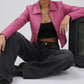 Trendy high-fashion model presentation featuring a tailored pink leather jacket styled effortlessly for an edgy streetwear look.