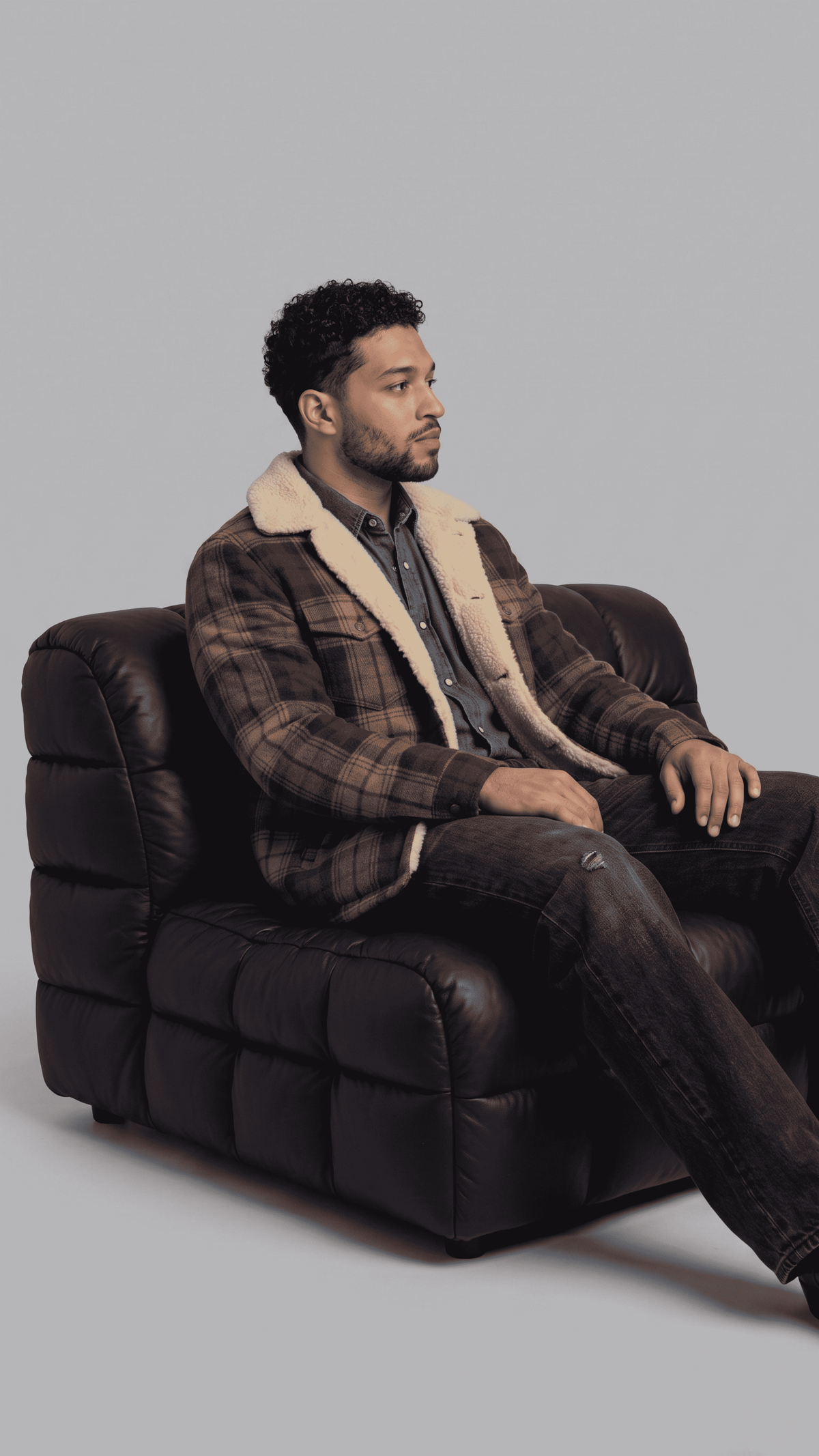 Heavy-duty plaid flannel shirt jacket with warm shearling design, perfect for casual everyday wear in cold weather.