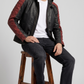 Men's modern streetwear fashion featuring a black and red bicolor leather jacket with a comfortable hood.