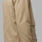 Close-up of premium breathable beige cotton fabric weave and high-quality neat stitching on the jacket collar.
