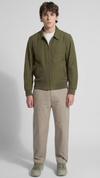versatile olive green cotton utility jacket featuring a clean silhouette for a modern military-inspired look.