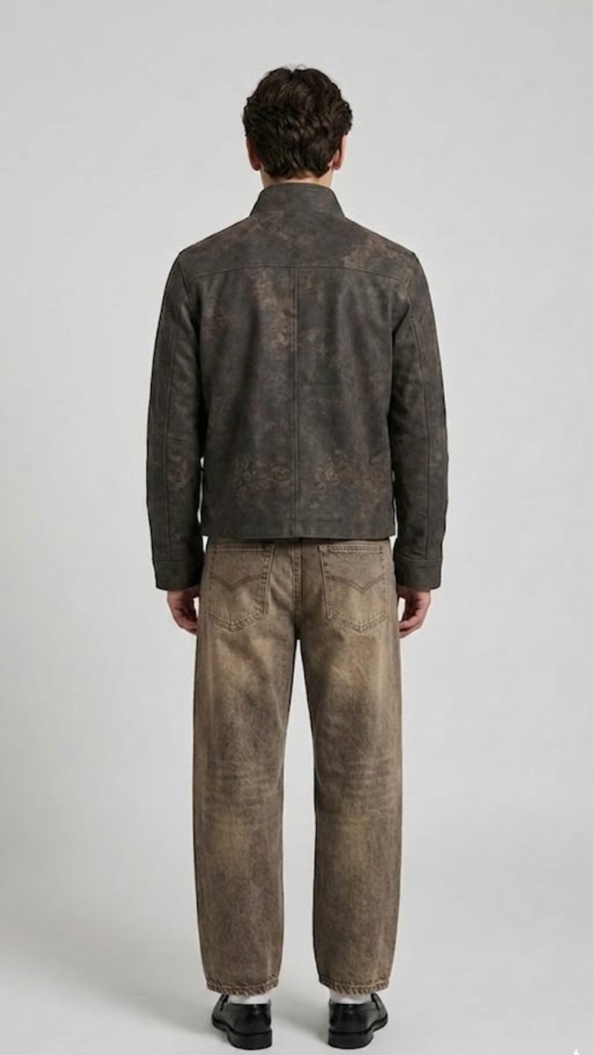 Mens sleek grey distressed leather jacket styled for a rugged streetwear outfit