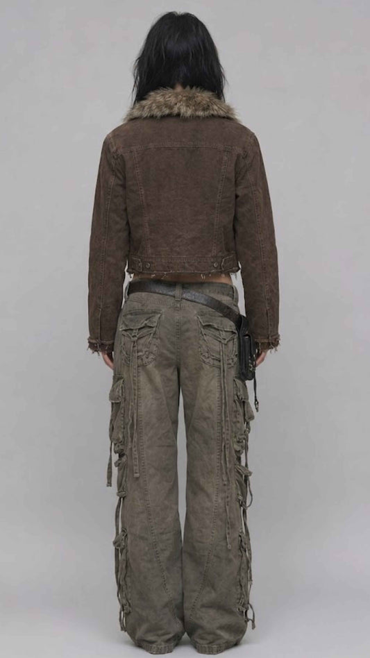 Back view of dark khaki denim Y2K jacket showing back yoke stitching and classic trucker coat seam details