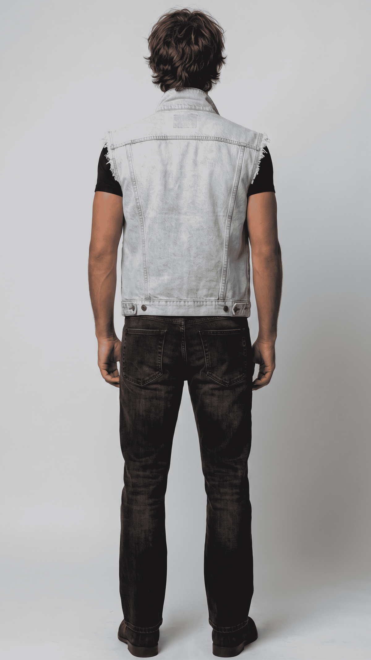 Sleek light wash denim sleeveless jacket designed for a modern urban street look and relaxed everyday wear.