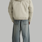 back profile showing the hood coverage and warmth of a white winter puffer jacket.