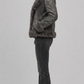 Full-length studio catalog shot of a women's JACKERO charcoal grey plush shearling winter jacket on a plain backdrop.