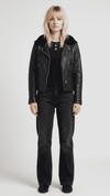 Premium edition front view of the Jackero premium black leather biker jacket, featuring heavy-duty polished zippers and luxury wide lapels.