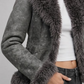 Tailored slim-fit women's grey suede shearling jacket with open front and soft shearling lining.