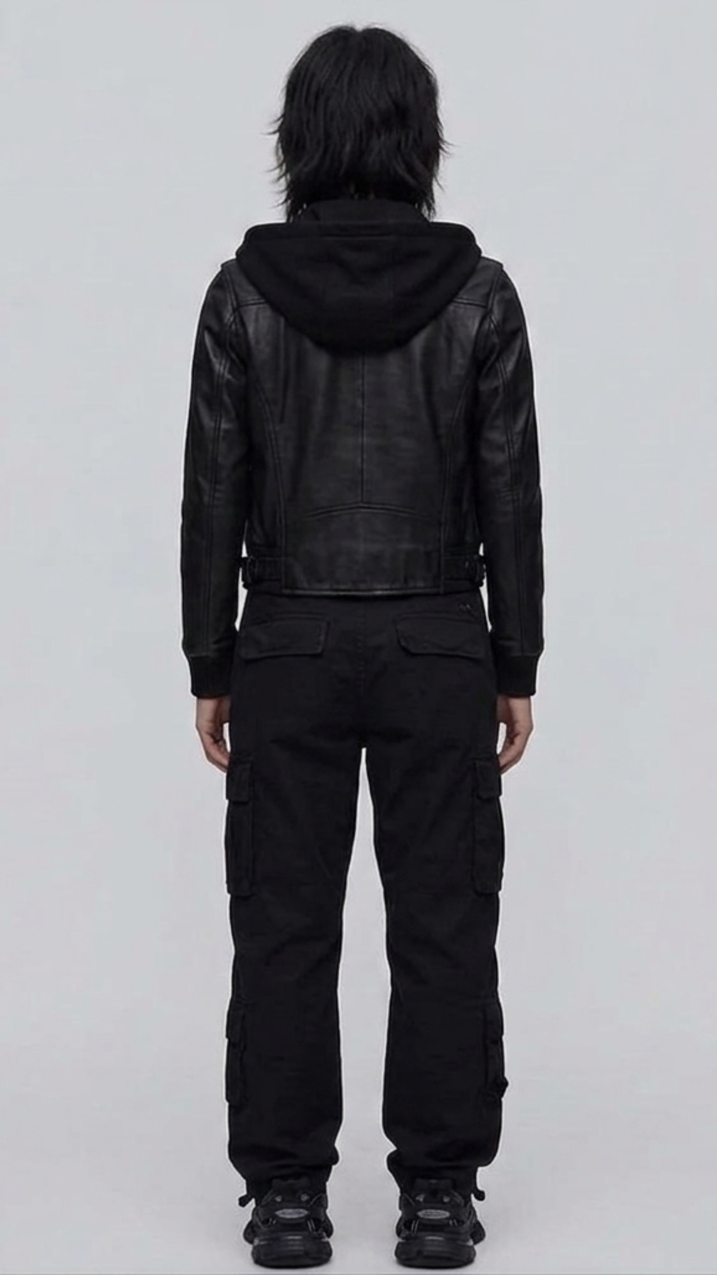 Symmetrical rear view studio shot highlighting the clean leather paneling and relaxed-fit hood drape of the black bomber coat.