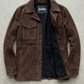 Jackero contemporary dark brown suede transitional shirt jacket beautifully presented against a clean, minimalist studio backdrop.