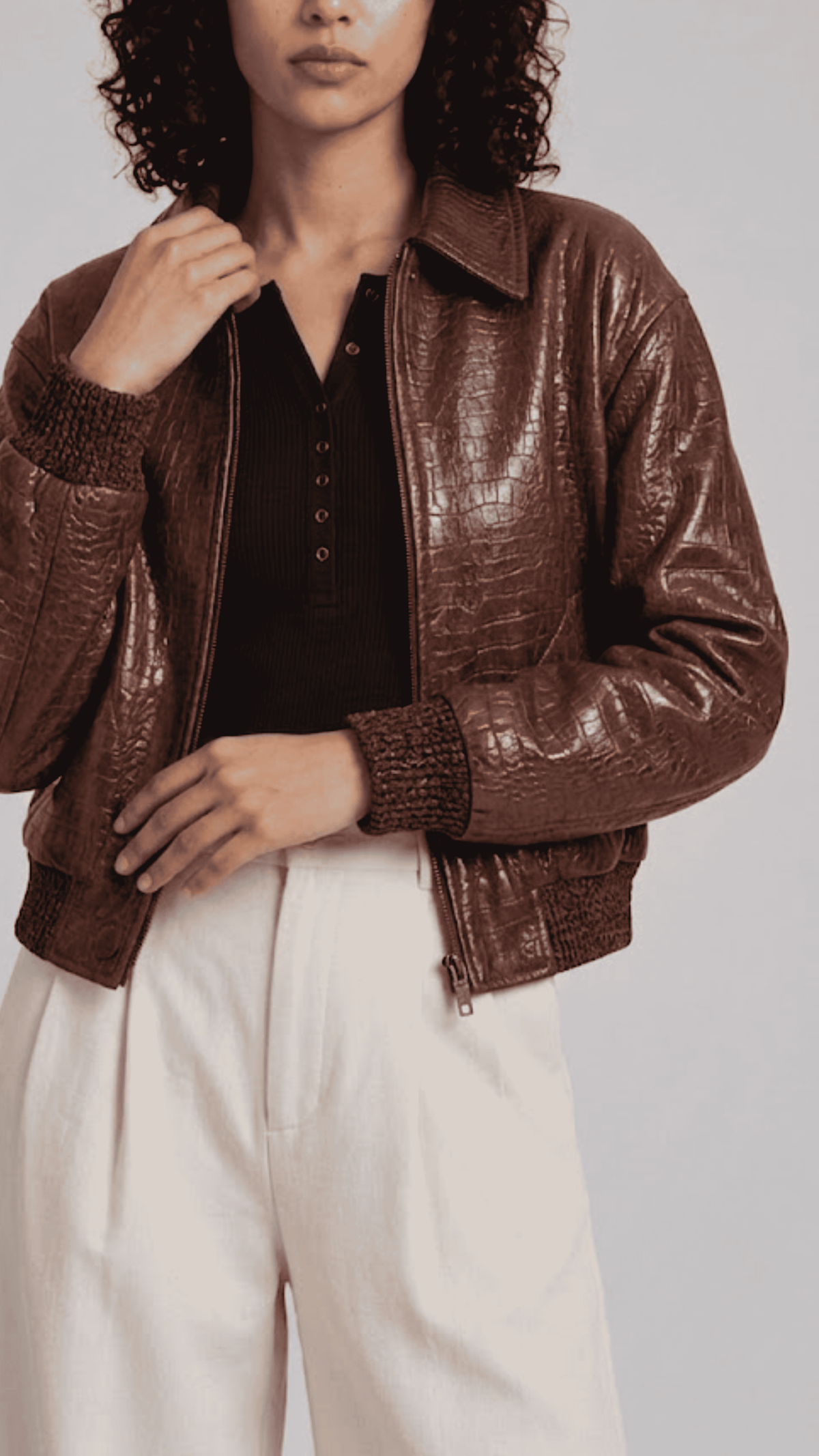 Structured women's brown croc leather coat with a relaxed bomber silhouette and gathered waist.