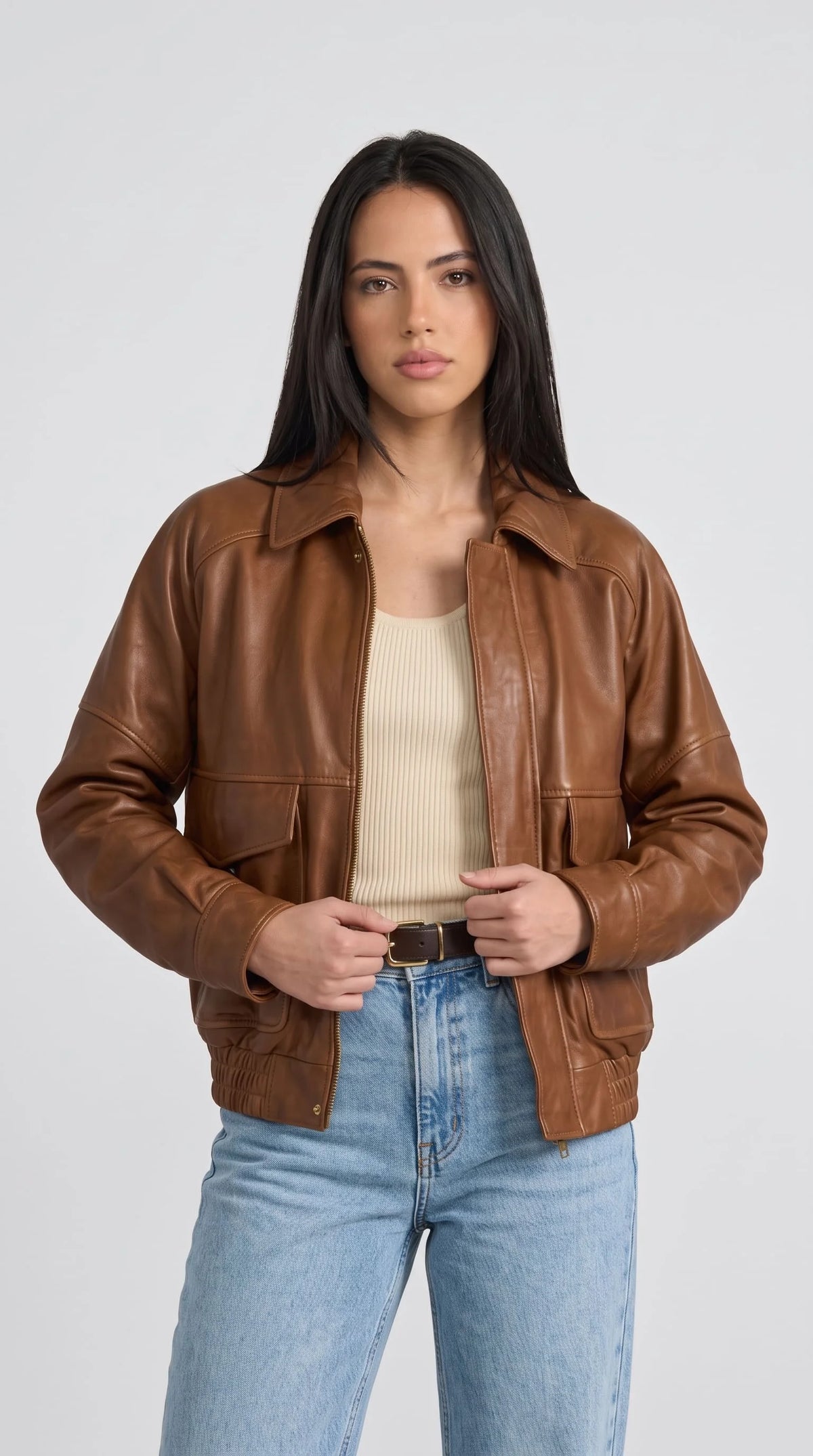 Women's tan brown genuine leather bomber jacket with classic pointed collar, full zip front closure, flap chest pockets and ribbed elastic waistband, vintage style premium outerwear for women